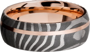 Handmade 8mm Tiger Damascus steel band featuring a sleeve and off-center inlay of 14K rose gold
