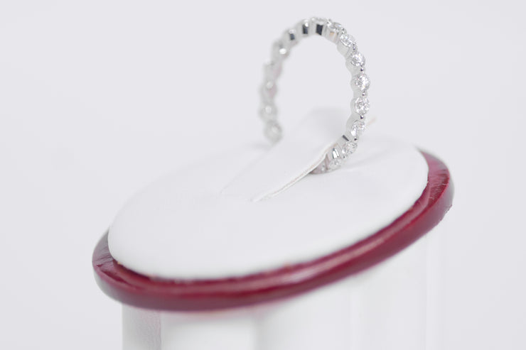 Eternity diamond shape share prong band