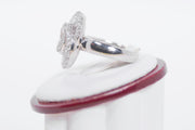 Tapered Baguette Diamonds And Round Diamond Ring