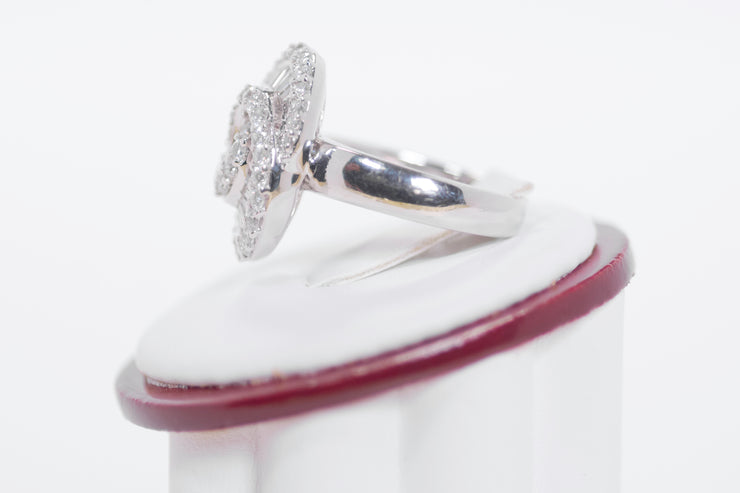 Tapered Baguette Diamonds And Round Diamond Ring