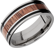 Titanium 8mm flat band with antiquing on both sides of an Koa hardwood inlay