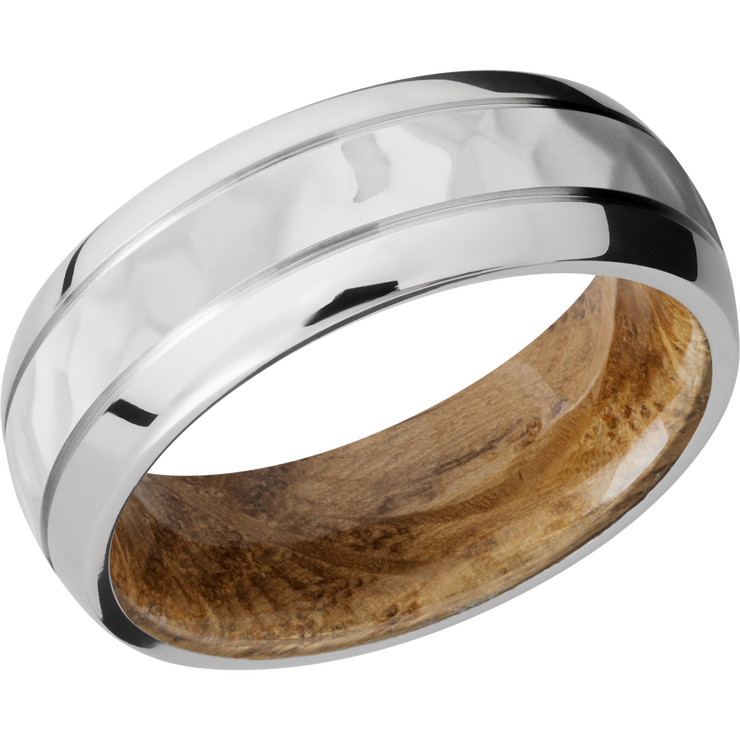 Cobalt chrome 8mm domed band with 2, .5mm grooves and a sleeve of Whiskey Barrel hardwood